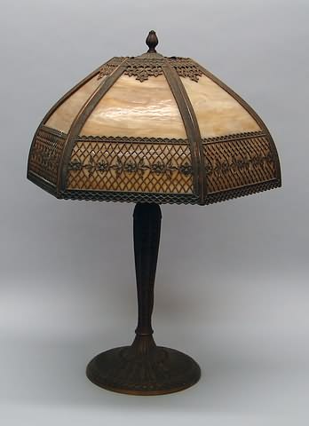 Appraisal: Hexagonal paneled brown and white slag glass shade sockets bronze