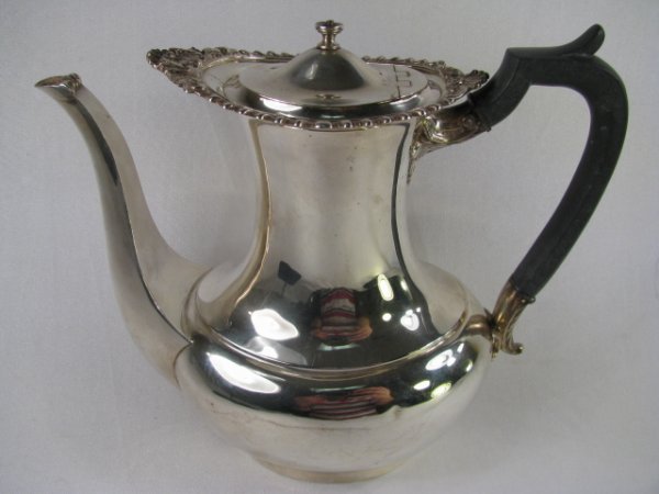 Appraisal: English sterling silver coffee pot with ebony wood handle Hallmarks