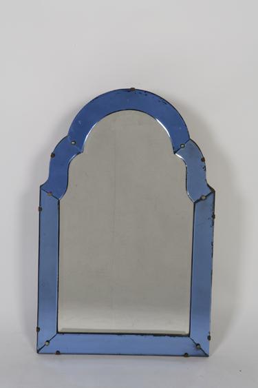 Appraisal: AN ART DECO WALL MIRROR the arch topped mirror with