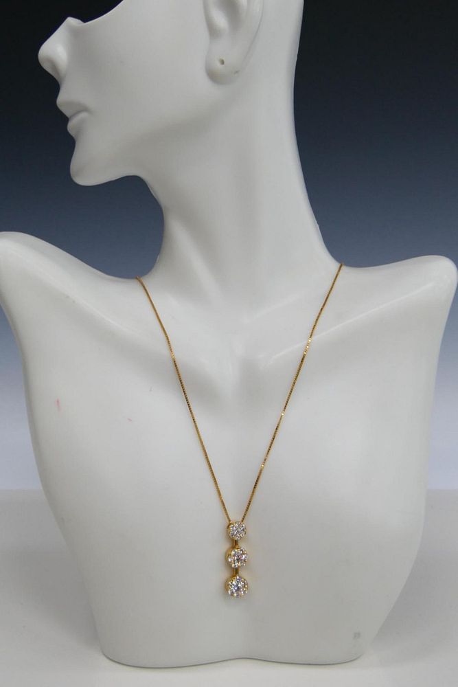 Appraisal: KT Y GOLD AND TRIPLE DIAMOND NECKLACE Chain is about