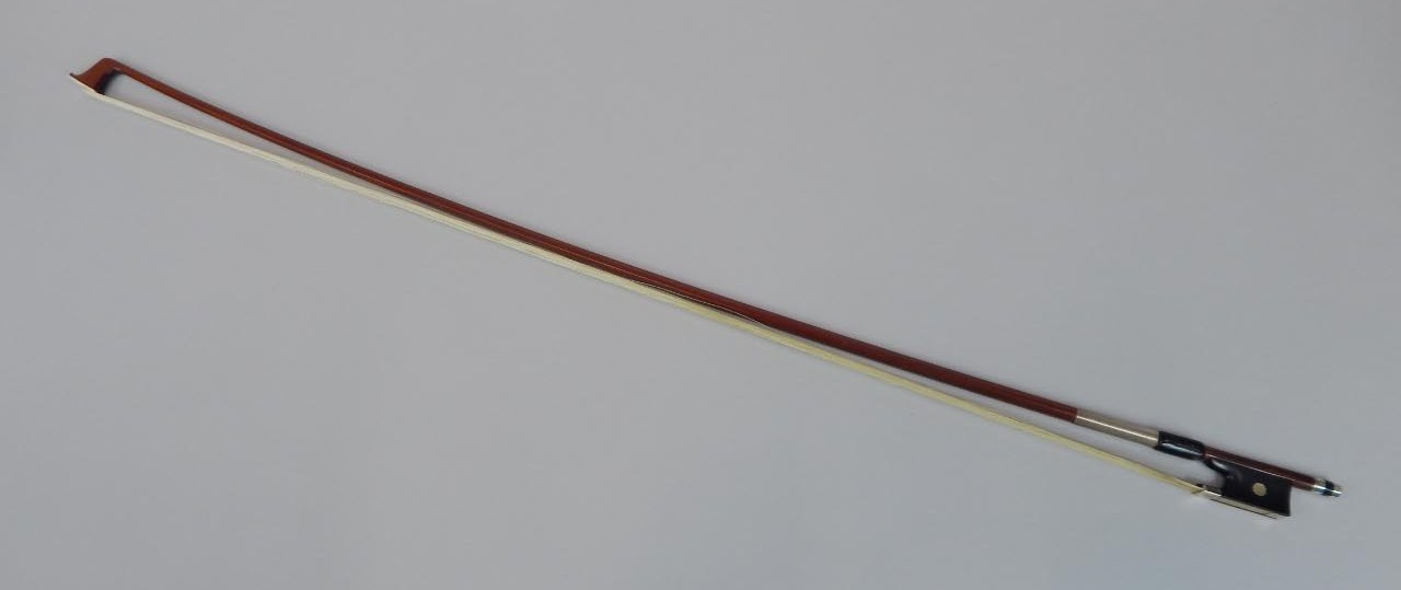 Appraisal: A German violin bow with white metal mounts stamped H