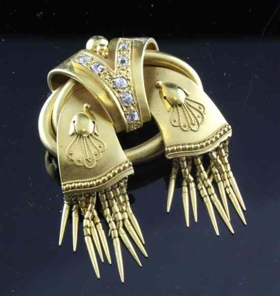 Appraisal: A Victorian diamond set gold brooch with canetille and fringe