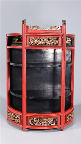 Appraisal: Chinese red lacquer and gilt carved wood hanging curio cabinet