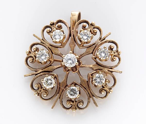 Appraisal: A diamond sunburst pendant-brooch estimated total diamond weight carats mounted