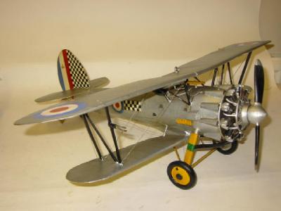 Appraisal: A scratch built model of a single engined biplane tinplate