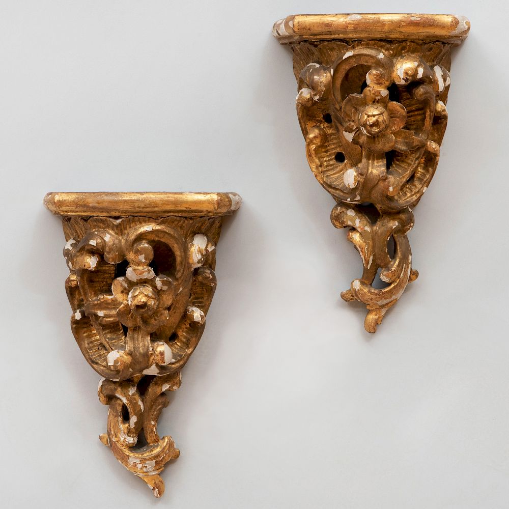 Appraisal: Pair of Rococo Carved Giltwood Wall Brackets Each with shell