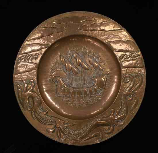 Appraisal: A John Pearson Arts Crafts copper charger decorated with a