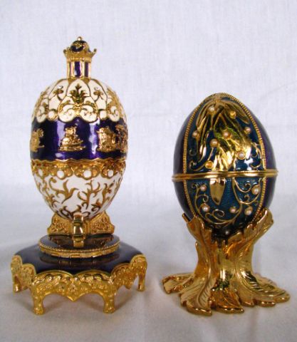 Appraisal: Two Edgar Berebi jeweled eggs both with cobalt enamel one