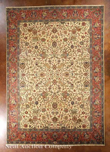 Appraisal: A Persian Tabriz Carpet camel central field red and teal