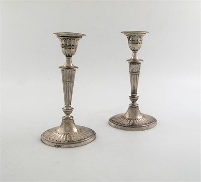 Appraisal: A pair of late Victorian Candlesticks of fluted oval form