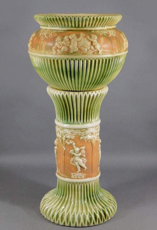 Appraisal: Roseville Pottery Donatello Jardiniere Pedestal Ohio Circa Donatello pattern jardiniere