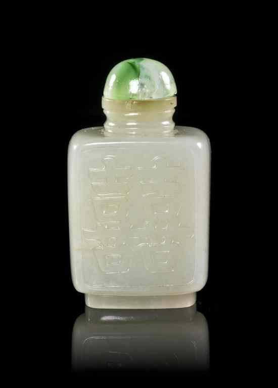 Appraisal: A White Jade Snuff Bottle of rectangular form having a