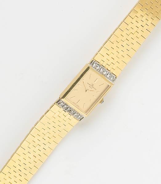 Appraisal: A lady's diamond and k gold integral bracelet wristwatch Baume