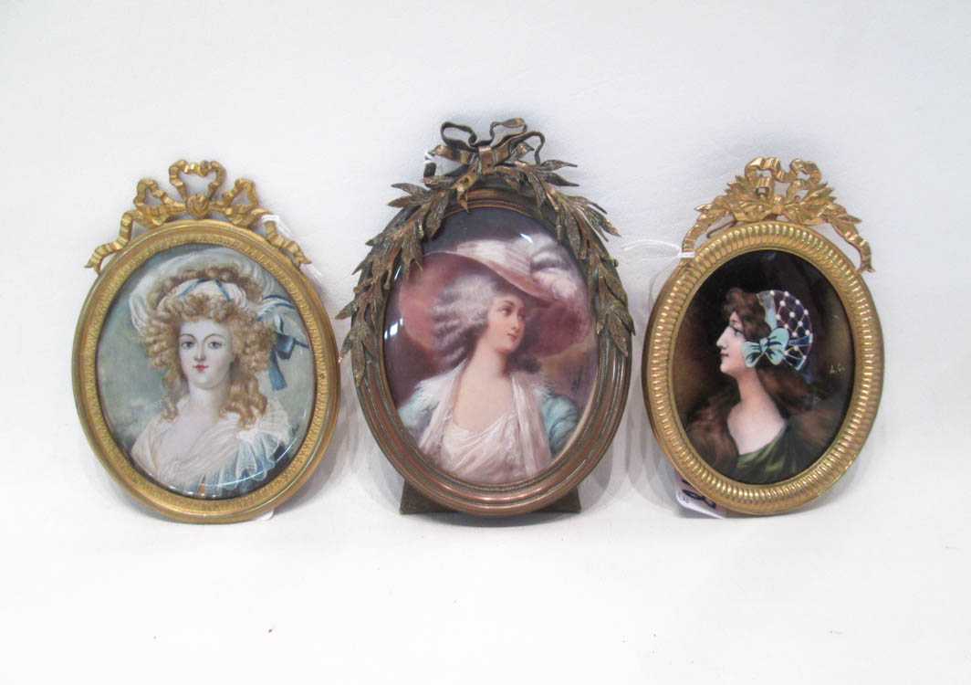 Appraisal: THREE OVAL MINIATURE PORTRAIT PAINTINGS in gilt metal frames British