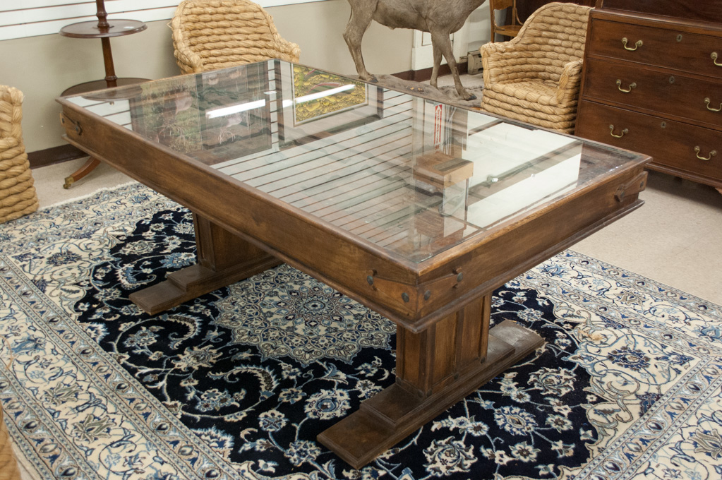 Appraisal: DOOR-TOP DINING TABLE India th century the rectangular top featuring