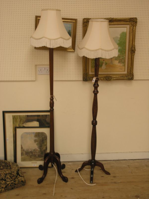 Appraisal: Two mahogany standard lamps each on cabriole leg base both