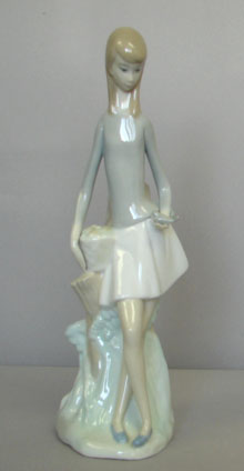 Appraisal: Nao by Lladro - Girl with Bird - Good Condition