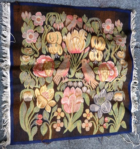 Appraisal: A small Swedish flatweave wool panel hanging the design attributed