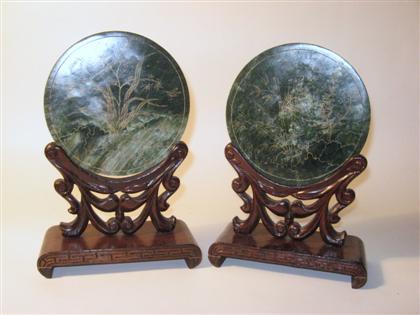 Appraisal: Pair of gilt decorated spinach jade table screen wood standsrepublic