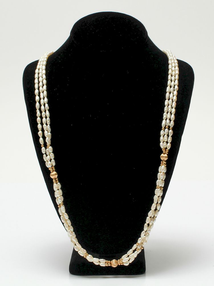 Appraisal: K Gold Three Strand Freshwater Pearl Necklace K yellow gold