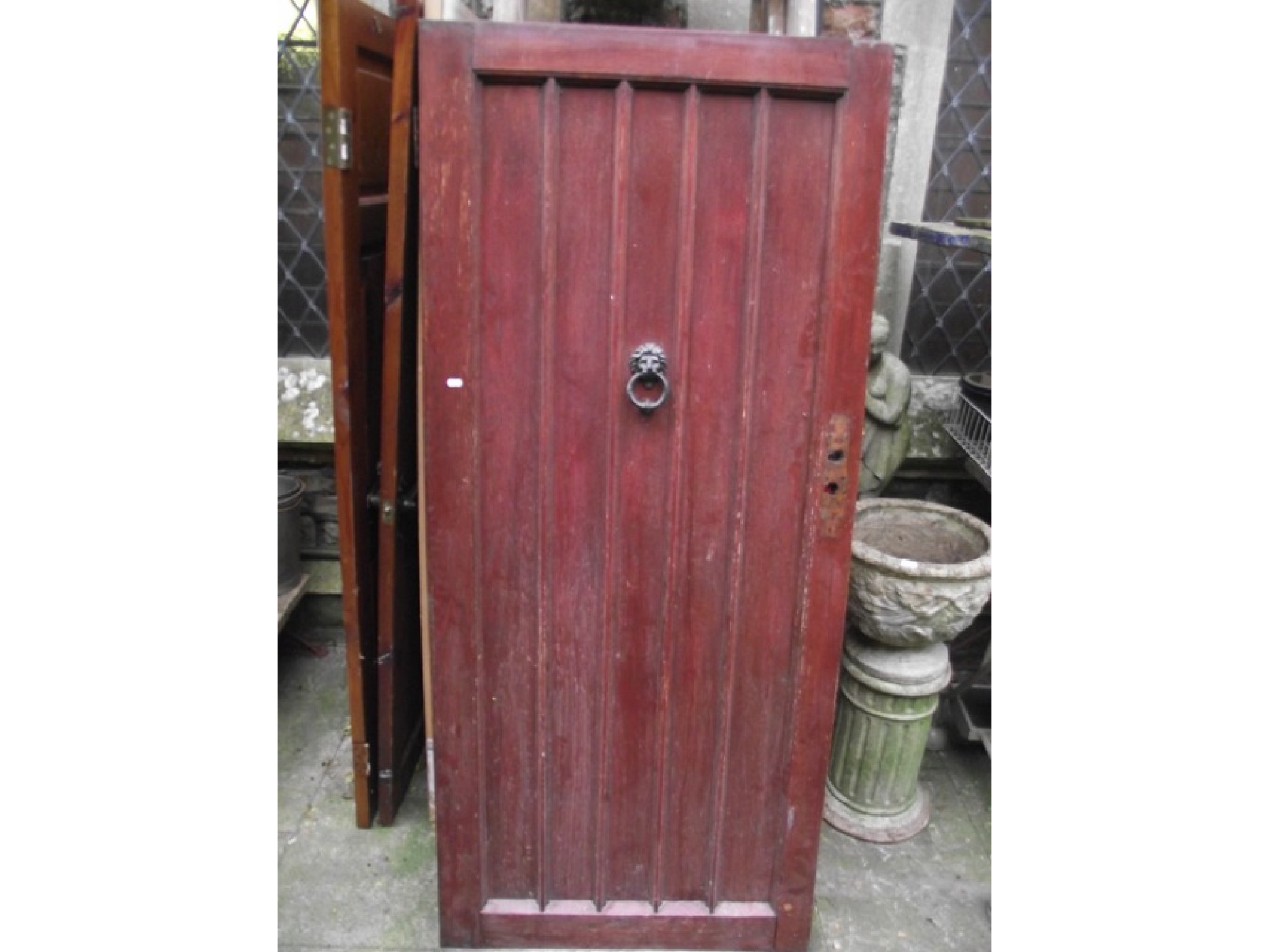 Appraisal: A heavy oak front door with moulded detail iron fittings