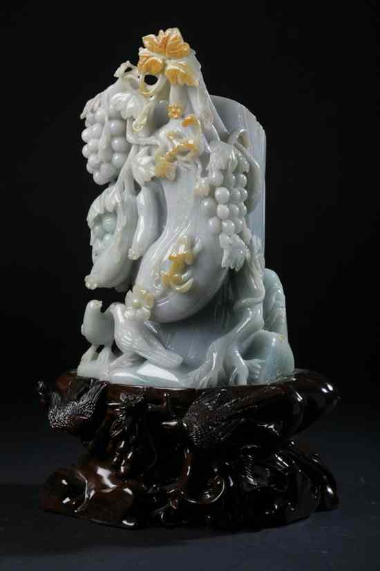 Appraisal: CHINESE CELADON LAVENDER AND RUSSET JADEITE MODEL OF TRUNK AND