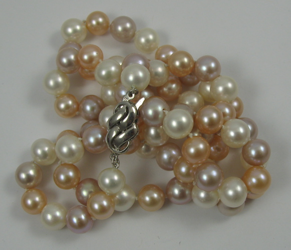 Appraisal: FRESHWATER PEARL NECKLACE in length with pink whit and violet