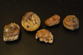 Appraisal: A COLLECTION OF FIVE VEGETABLE IVORY NETSUKE Including a rat