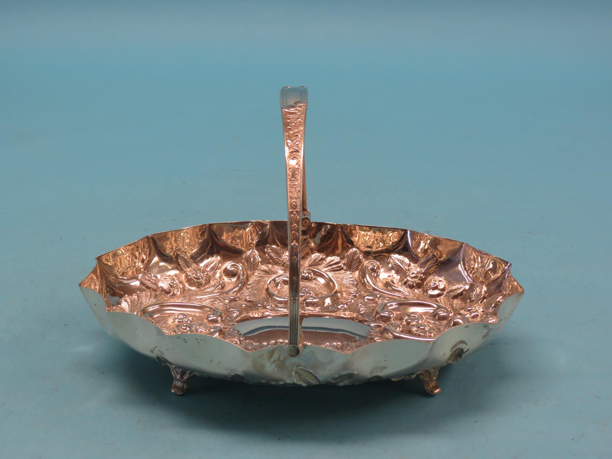 Appraisal: An Edward VII silver bread basket oval-shape deeply embossed with