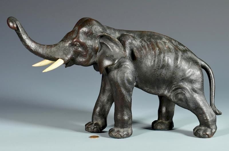 Appraisal: Japanese Bronze Elephant Marked Japanese bronze elephant sculpture depicted standing