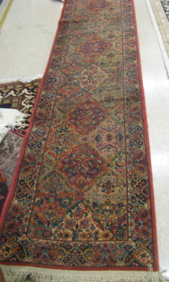 Appraisal: KARASTAN AMERICAN ORIENTAL RUNNER multicolor panel Kerman design machine loomed