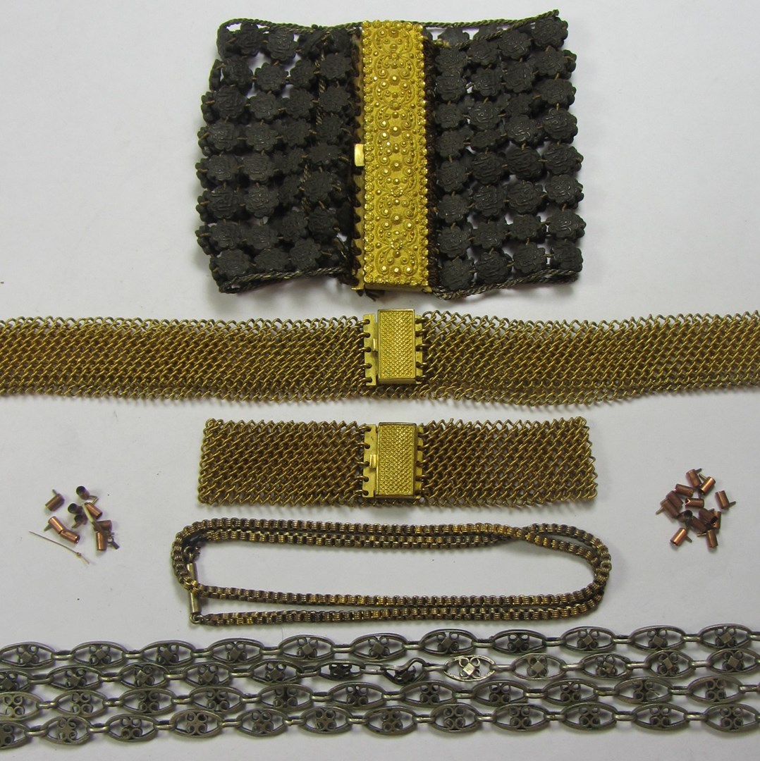 Appraisal: A wide moulded composition link bracelet on a rectangular gilt