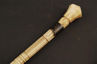 Appraisal: An early th century whalebone cane with a faceted detachable