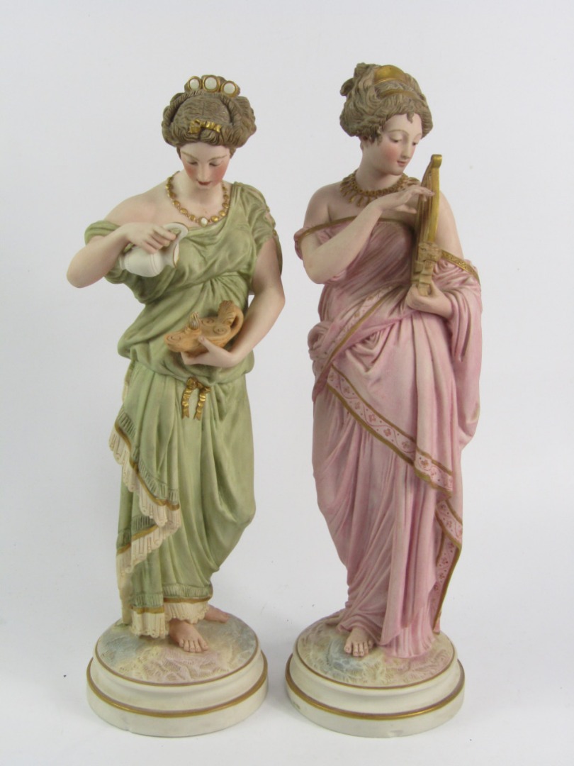 Appraisal: A pair of Robinson and Leadbetter Parian figures of Roman