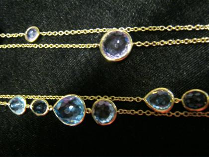 Appraisal: Two karat yellow gold and gem set necklaces IppolitaOne set