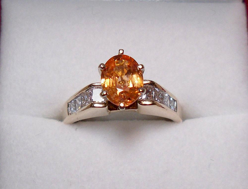 Appraisal: Diamond and Orange Sapphire Ring K yellow gold contemporary-style ring