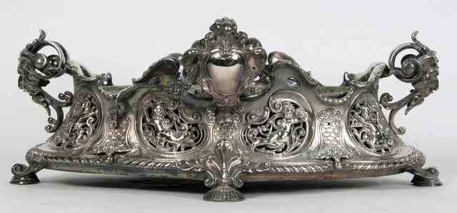 Appraisal: An electroplated silver table jardini re of oval form pierced