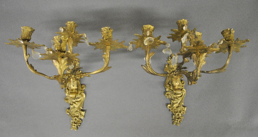 Appraisal: - Two cast brass metal leaf-form wall sconces early th