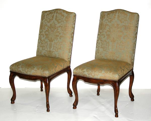 Appraisal: A pair of Rococo style upholstered walnut side chairs height