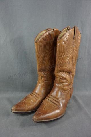 Appraisal: Tooled brown cowhide leather pointed toe and tapered heel Lightly