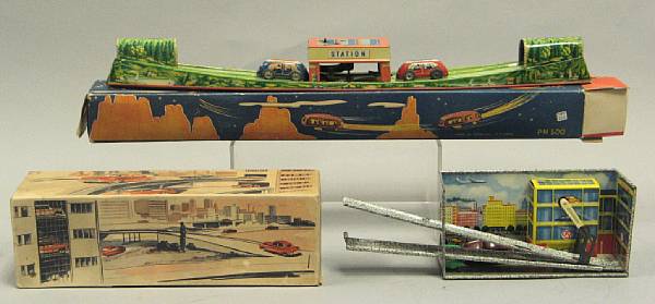 Appraisal: Boxed German articulated toys A scarce PN Tic-Tac automotive toy