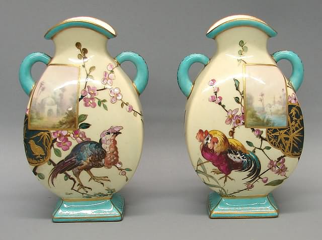 Appraisal: Painted rooster and birds upright oblong reserve with Moorish landscape