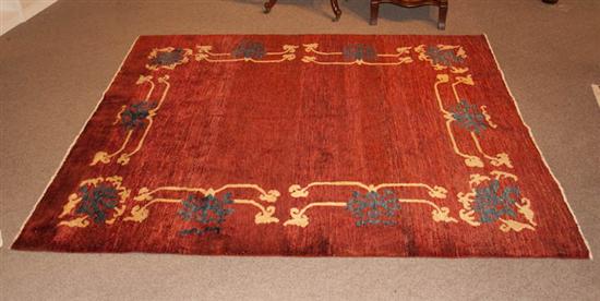 Appraisal: Tibetan Wool Rug red ground with blue and yellow Tibetan-style