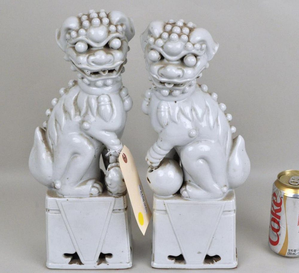 Appraisal: Pair Chinese Blanc de Chine Foo Dogs male and female