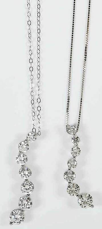 Appraisal: Two kt Necklaces one with graduating round faceted moissanite other