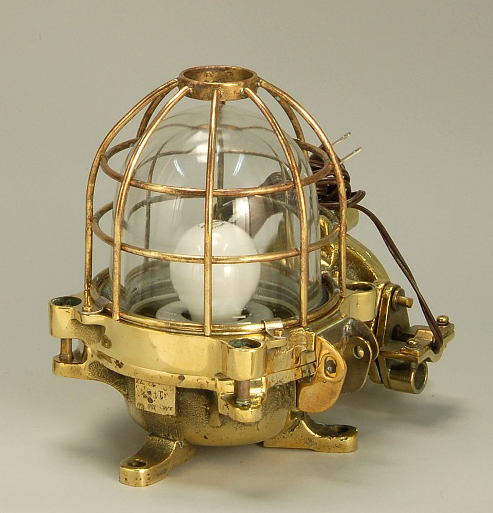 Appraisal: BRASS AND GLASS BULKHEAD LIGHT Explosion proof Glass globe and