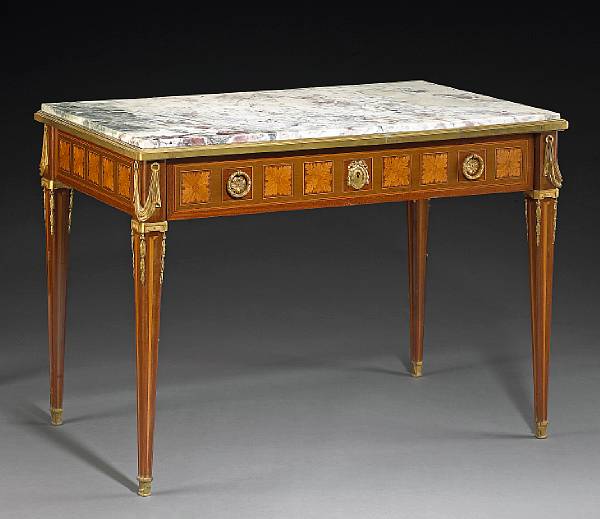 Appraisal: A Louis XVI style gilt bronze mounted inlaid mahogany table