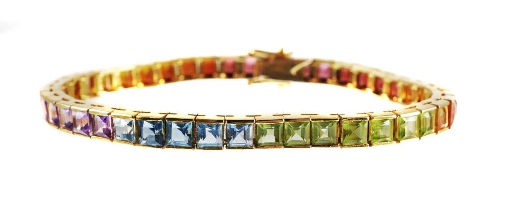 Appraisal: K yellow gold bracelet contains square cut citrine peridot topaz