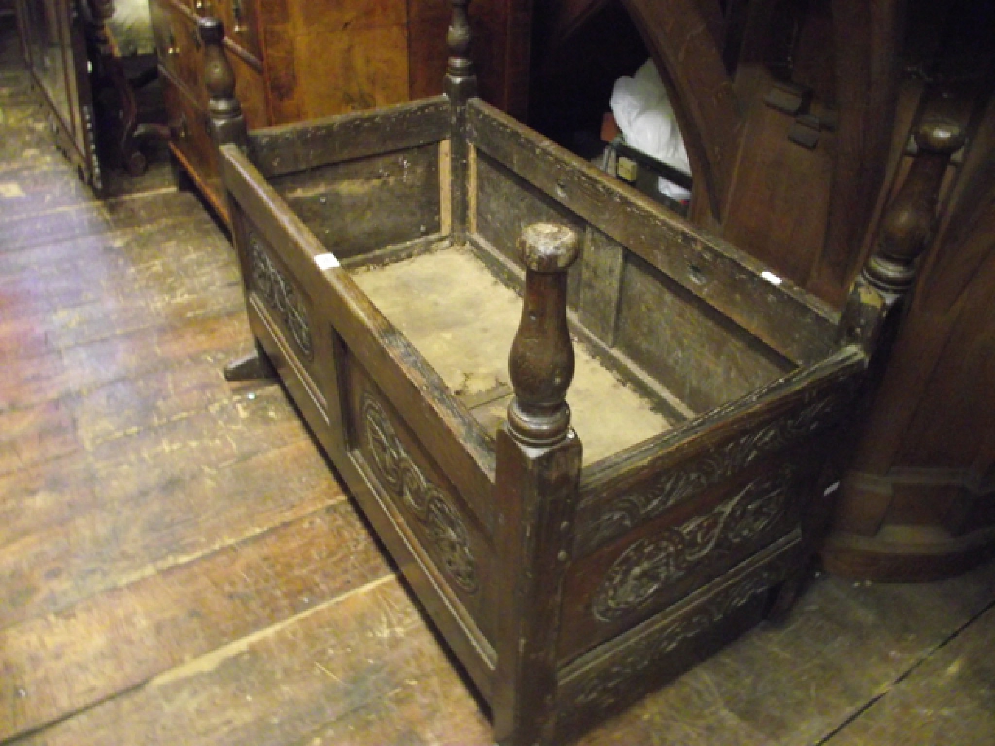 Appraisal: An old English oak cradle of usual form with carved