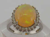 Appraisal: An carat white gold opal and diamond ring the large